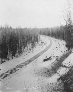 809px-Railroad_construction_-_ties_awaiting_rails,_Alaska,_1915